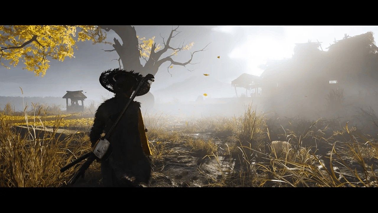 A lone samurai walking through a misty, golden field toward an abandoned village under dramatic sunlight in Ghost of Yōtei